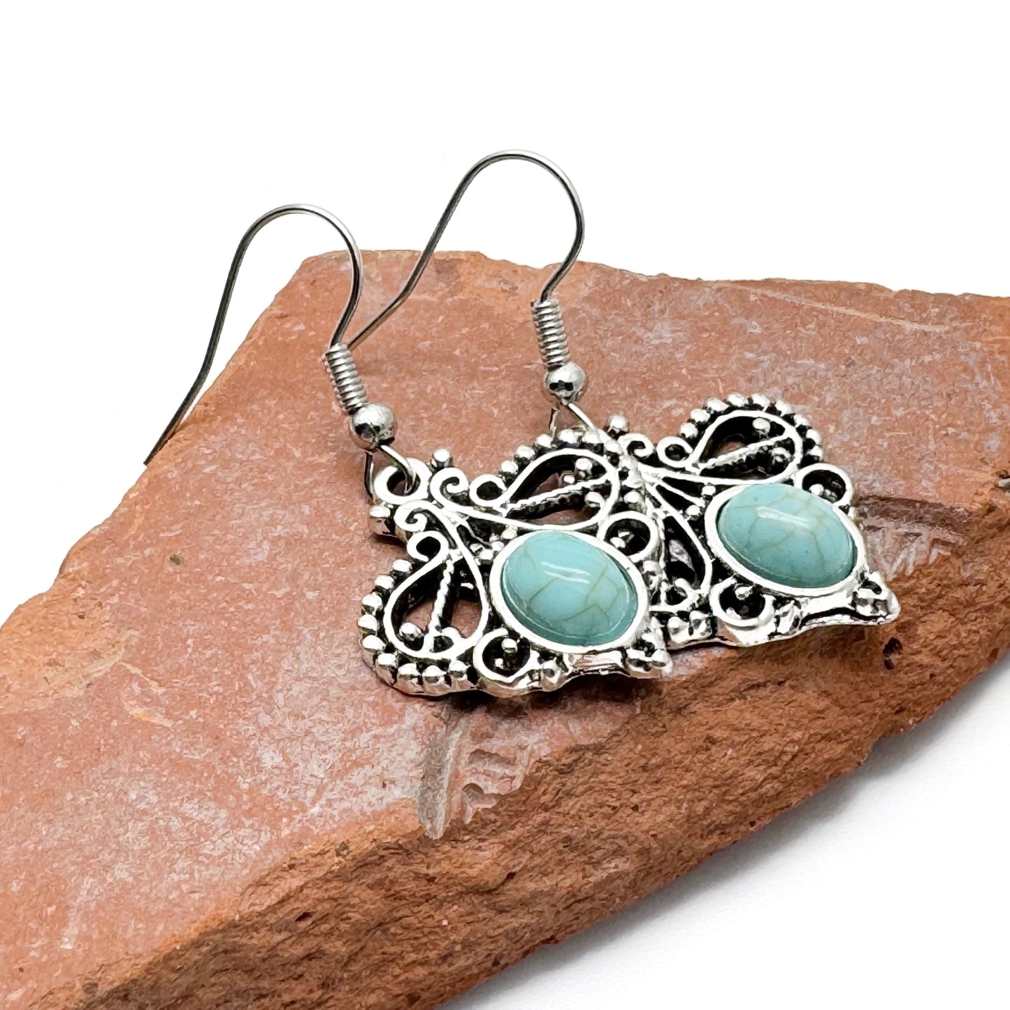 Turquoise Drop Earrings, Swirly Silver Tone Charms with Blue Resin Stone