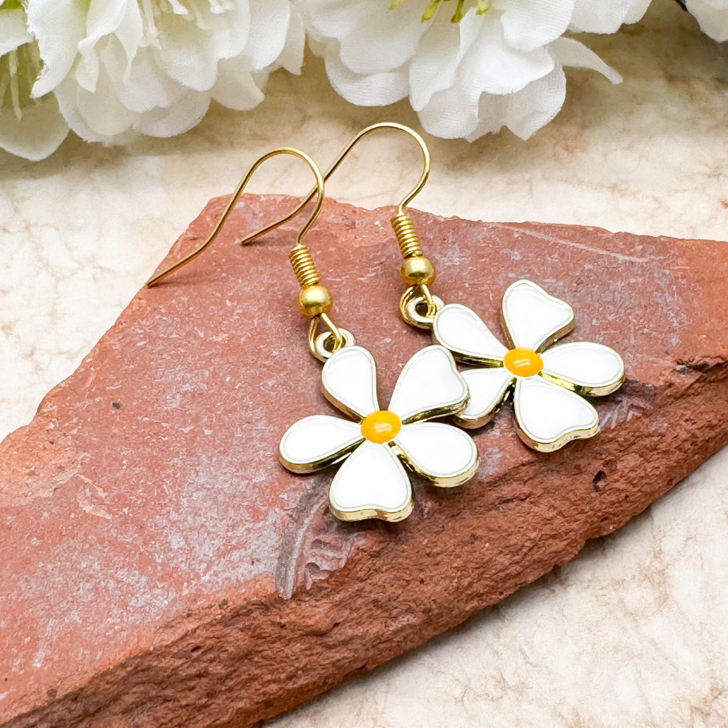 White Enamel Flower Earrings on Gold Tone Hooks : 39mm long