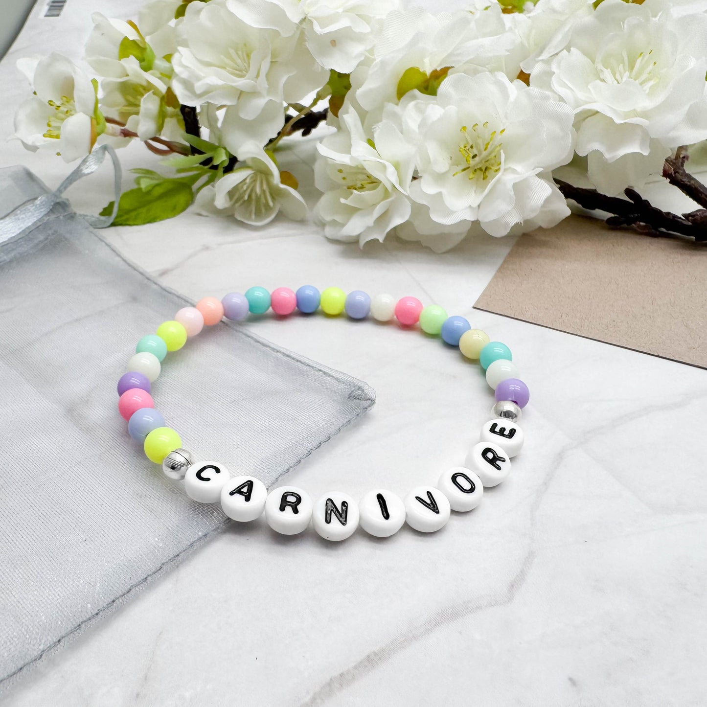 CARNIVORE Awareness Bracelet - Acrylic Letter Beads