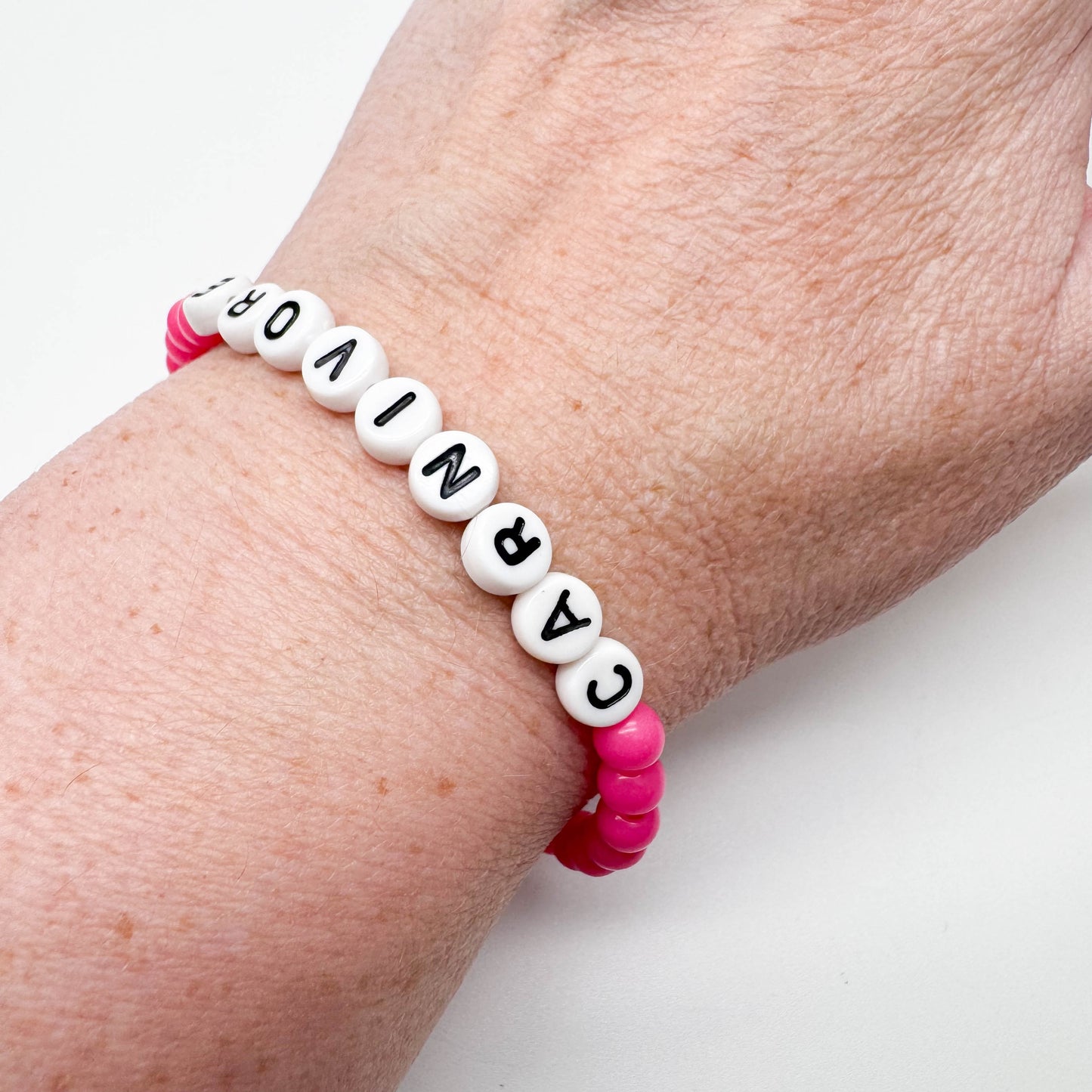 CARNIVORE Awareness Bracelet - Acrylic Letter Beads