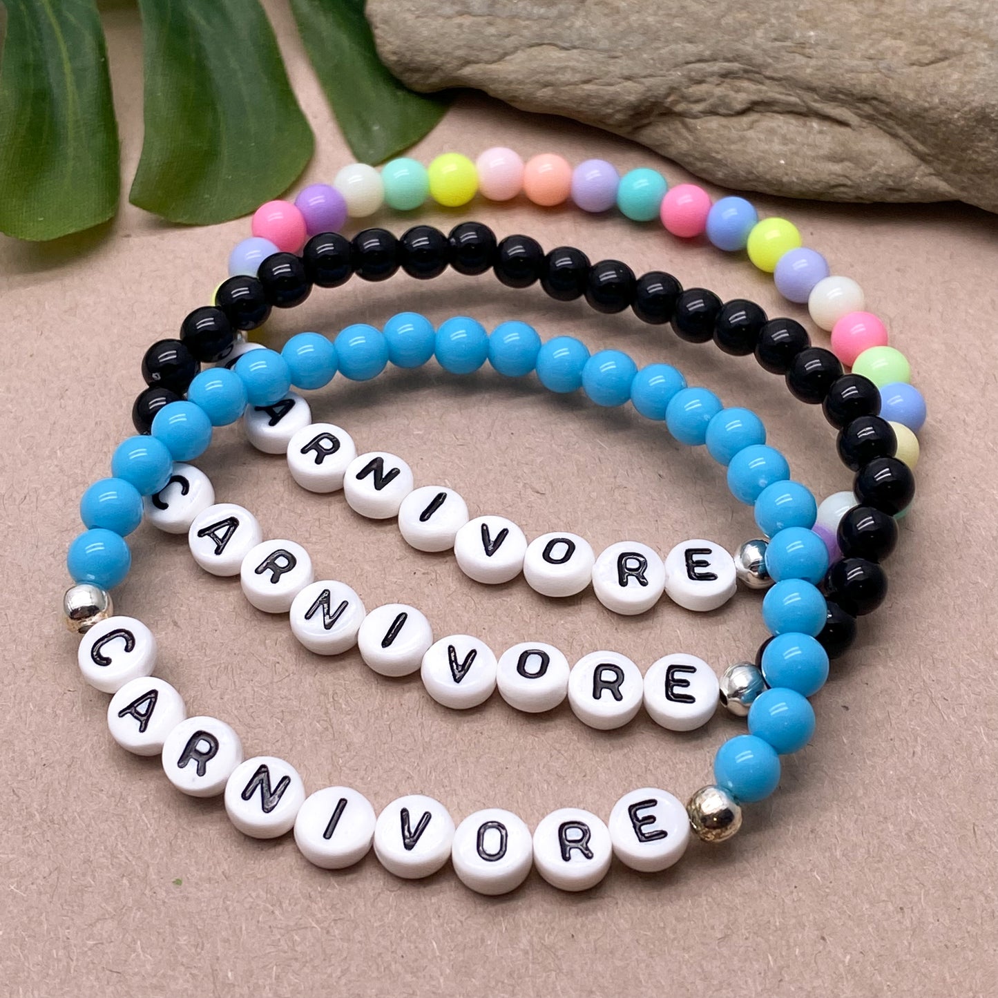 CARNIVORE Awareness Bracelet - Acrylic Letter Beads