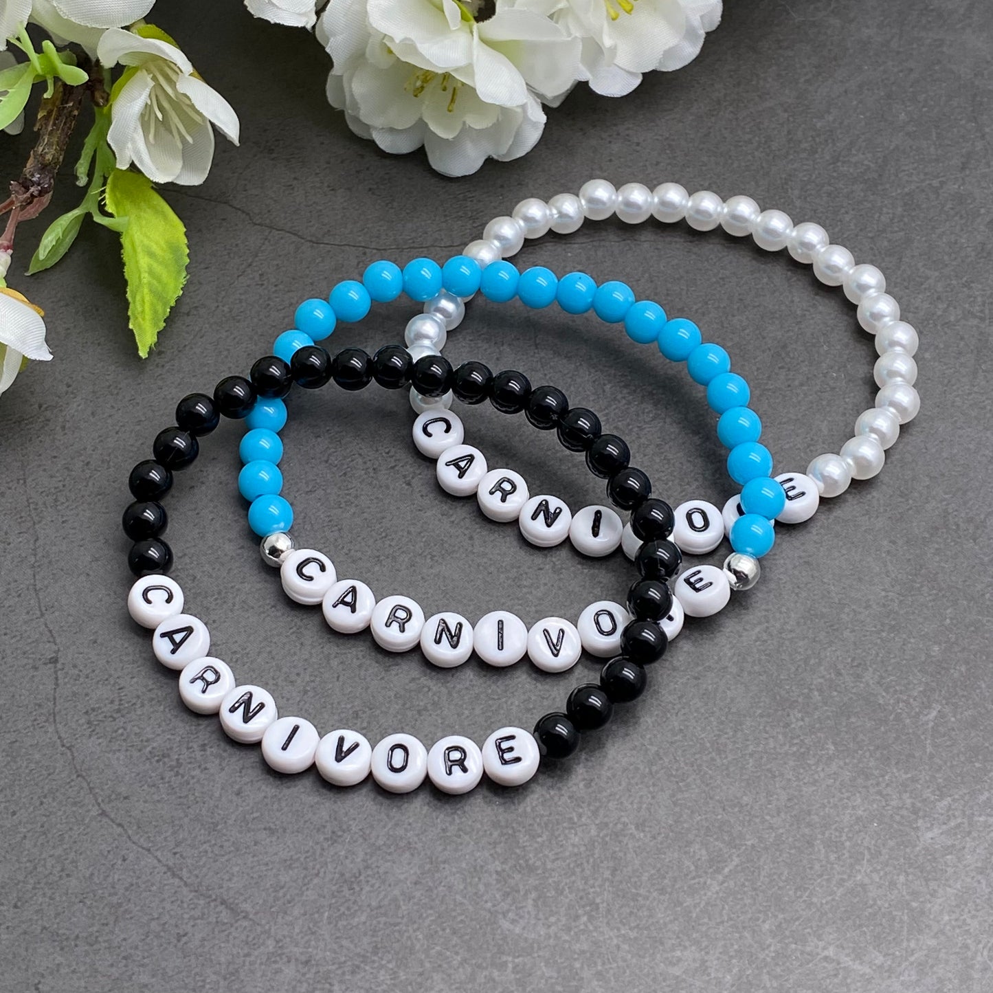 CARNIVORE Awareness Bracelet - Acrylic Letter Beads