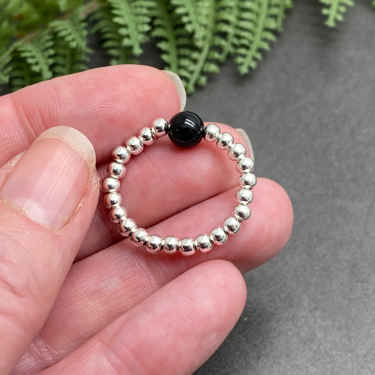 Black Onyx Stretch Ring with Silver Plated Beads