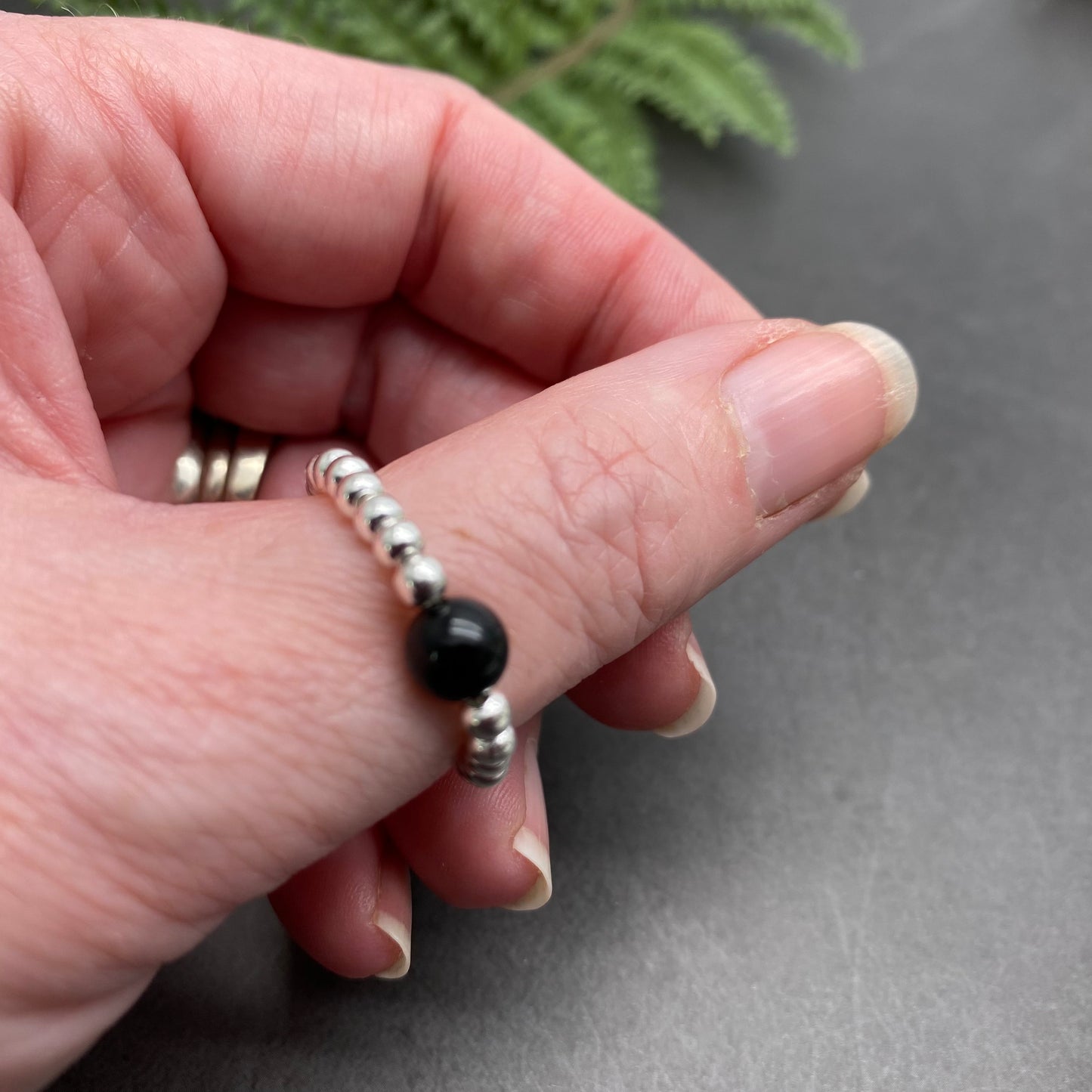Black Onyx Stretch Ring with Silver Plated Beads