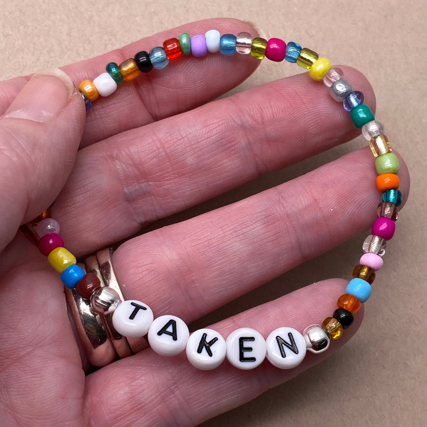 TAKEN Message Bracelet - Glass Seed Beads