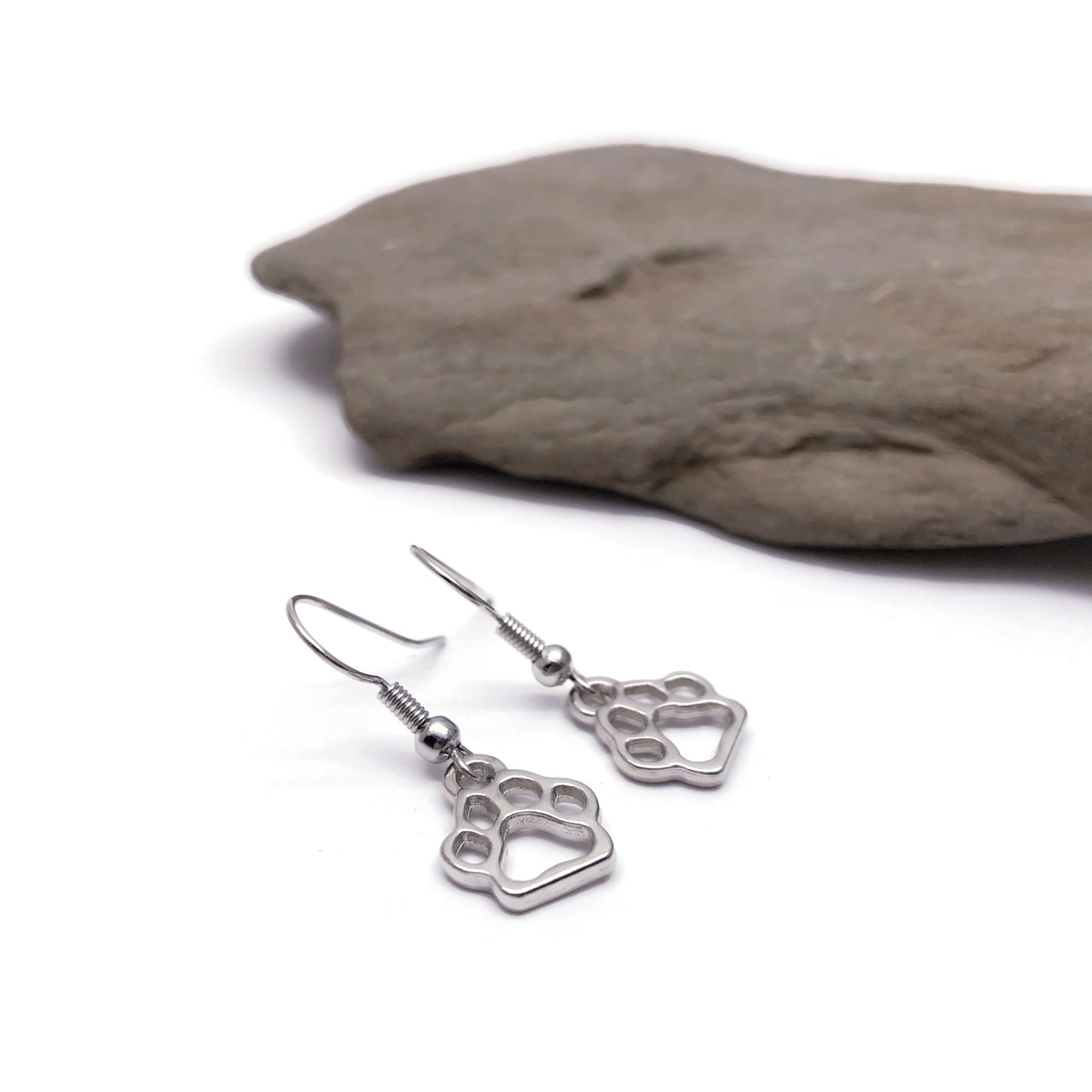 Paw print charm earrings flat side