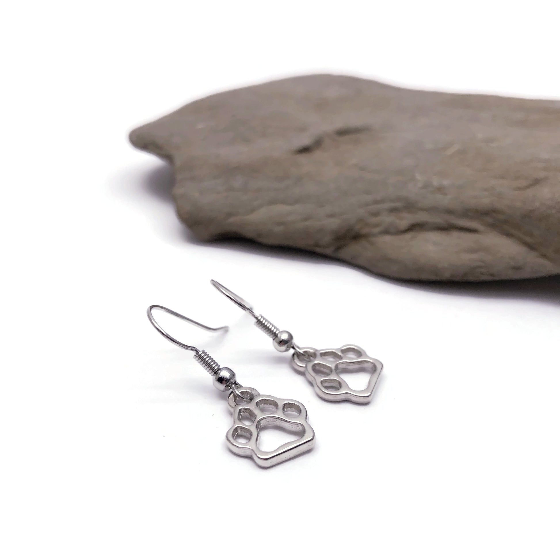 Paw print charm earrings flat side